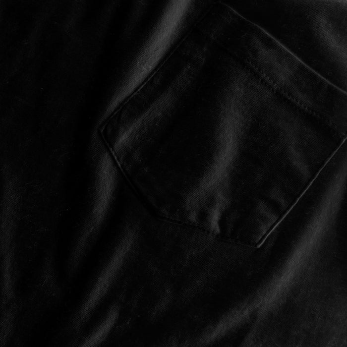 Black Pocket Crew Tee with visible cotton texture and stitched pocket.