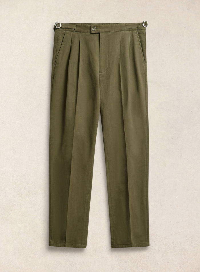 A flat-lay of the Percival Blake double pleated tailored trousers in forest green brushed moleskin with side adjusters.