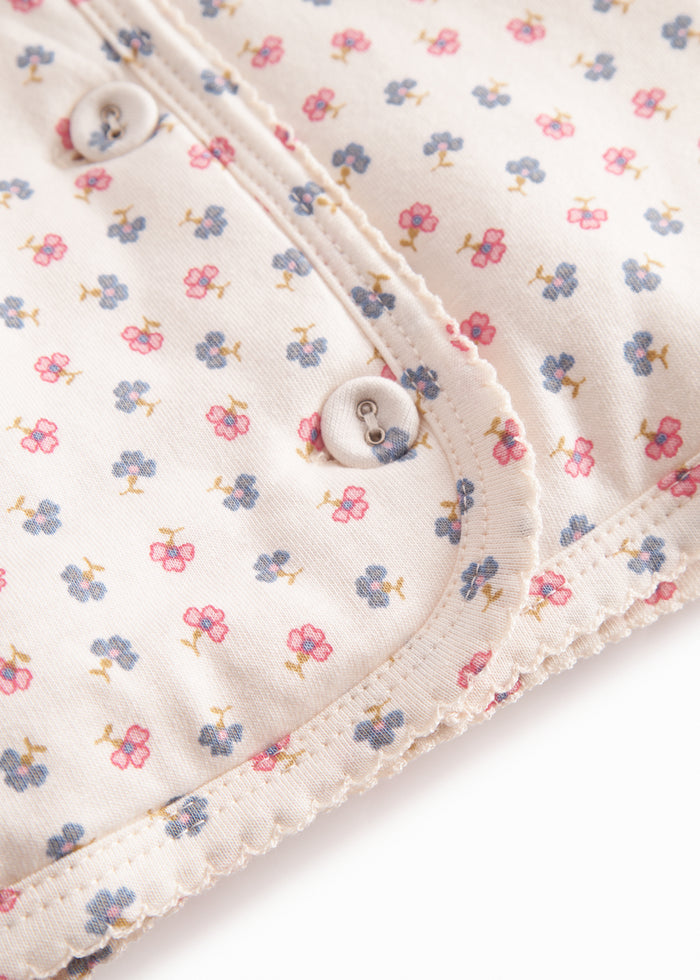 The jacket for newborn and baby with hat, snap closure, and flower pattern.
