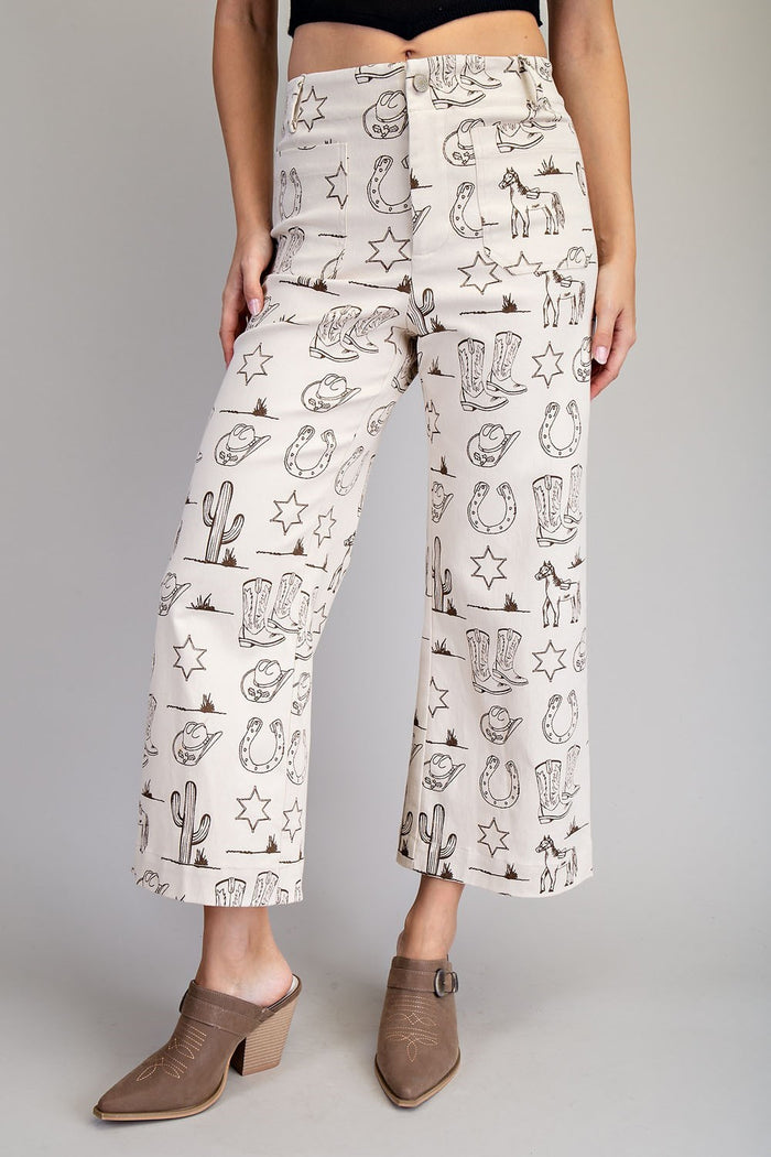 cream pants with western design