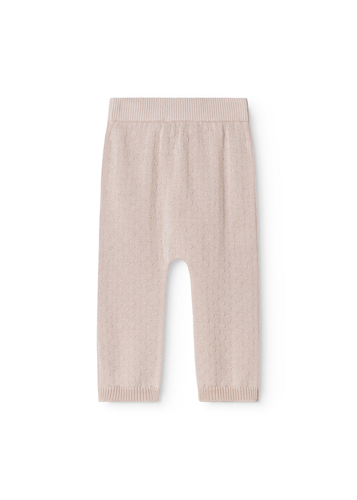 Strikbukser i misty pink med elastisk talje og ribafslutning forneden