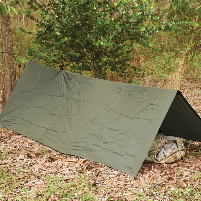 Snugpak Stasha G2 tarp shelter set-up outdoors in a tent configuration with a sleping bag inside
