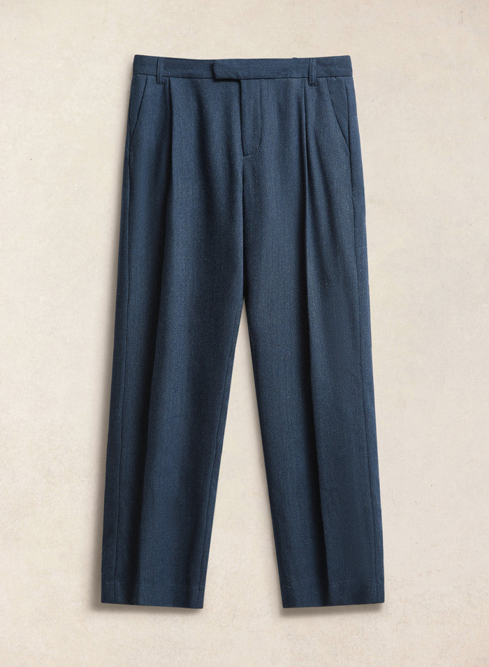 Percival Stanley navy herringbone wool pleated tailored trousers, featuring a pleated front and clean straight leg.