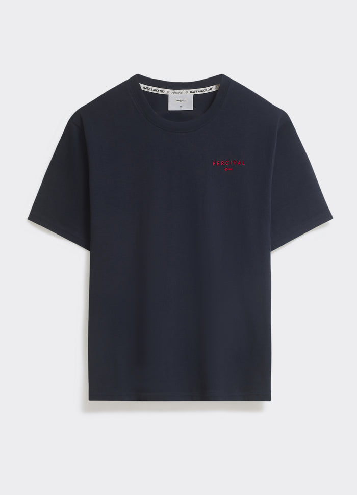 The Percival Waves T Shirt in navy, a cotton jersey crew neck with a red embroidered chest logo, shown flat.