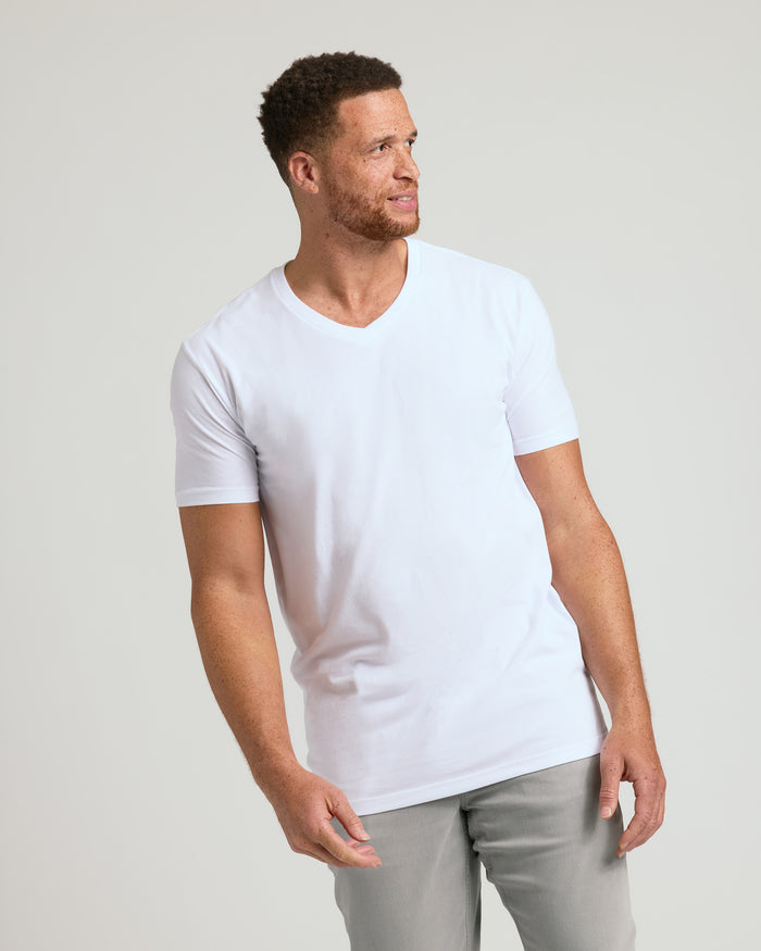 White Classic Tall V-Neck 10-Pack showcased on a casually posed man.