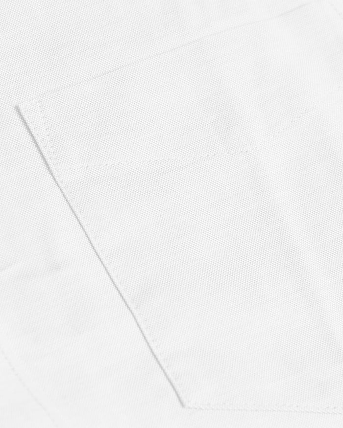 White Stretch Oxford Long Sleeve Shirt showing twill weave and pocket stitching.