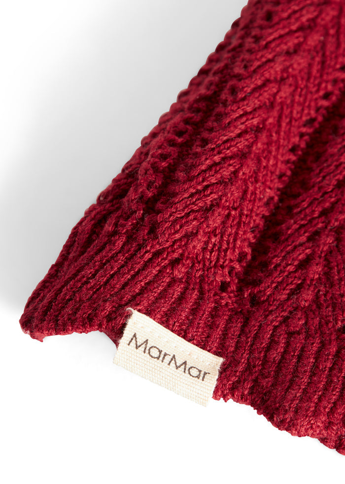 Red knitted Santa hat with tassel for baby
