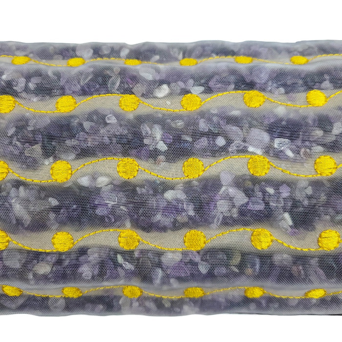 Close-up of fabric textured with small amethyst stones and yellow stitching detail on the Amethyst Bolster Firm - Heated InfraMat Pro® | HealthyLine for wellness and recovery use.
