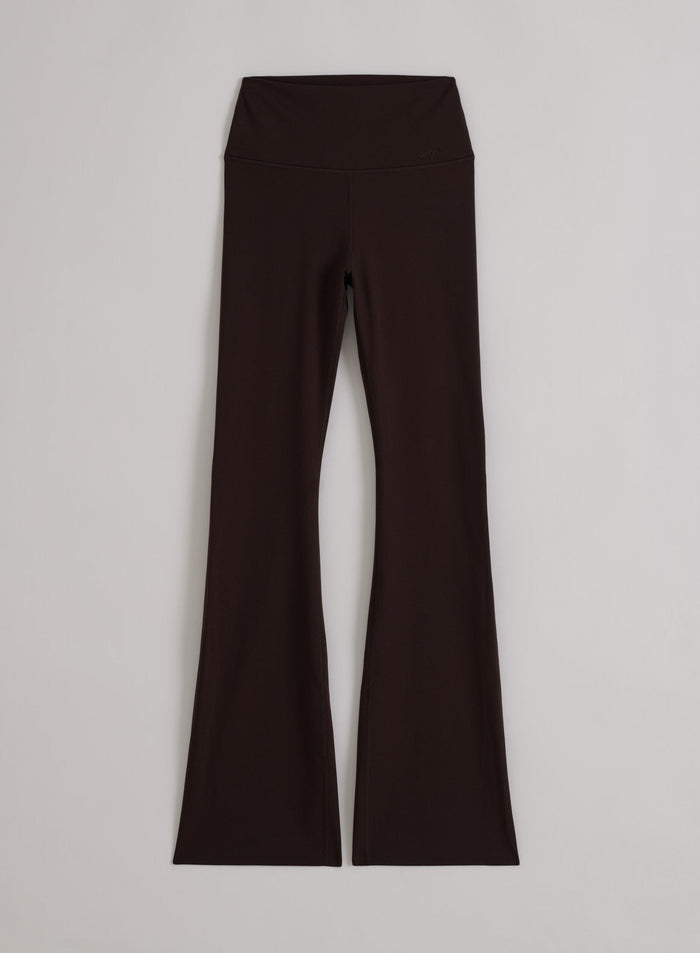 Dark brown aim'n Sense Flare Tights in a flat lay.