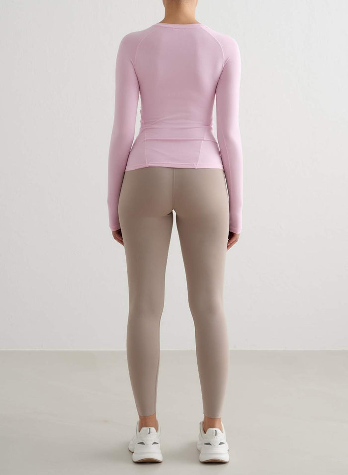 Cotton Candy pink Soft Basic Long Sleeve by aim'n featuring raglan sleeves and a second skin feel, back view.