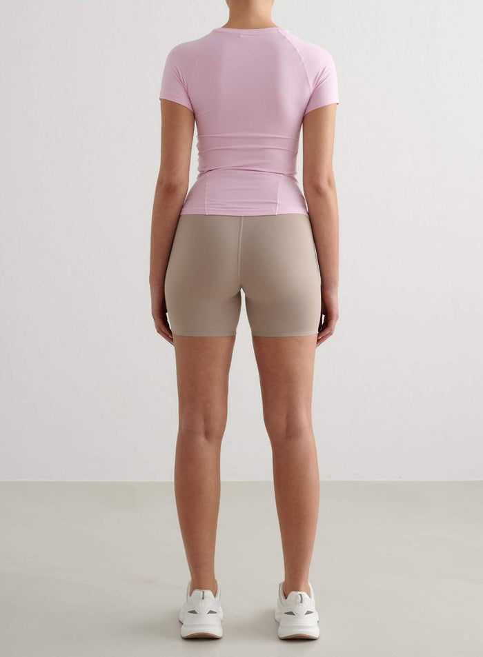 Cotton Candy pink Soft Basic Short Sleeve top by aim'n shown from the back, featuring a soft second skin feel.