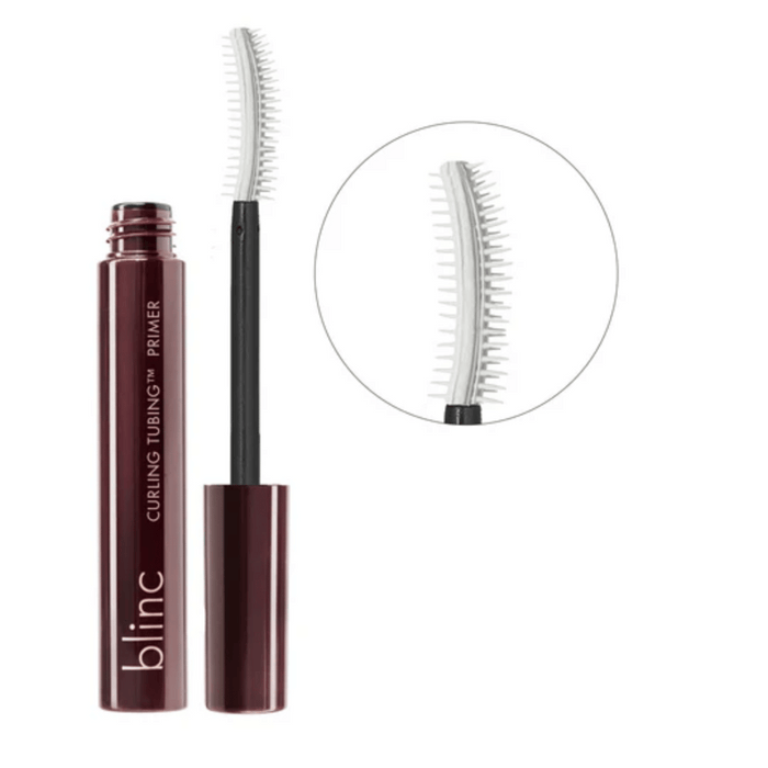 Open tube and curved brush applicator of Curling TUBING™ Primer | Blinc, designed for precise eyelash preparation and enhanced curl effect in skincare routine.