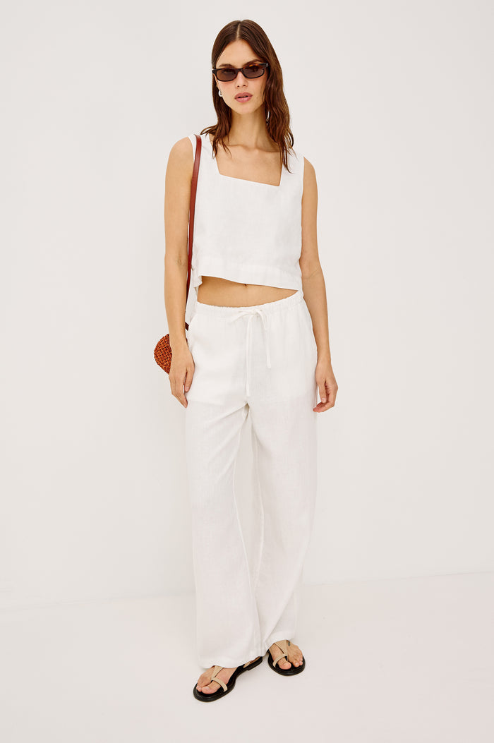 Emmie high rise linen wide leg pant with drawstring in white - front view on model