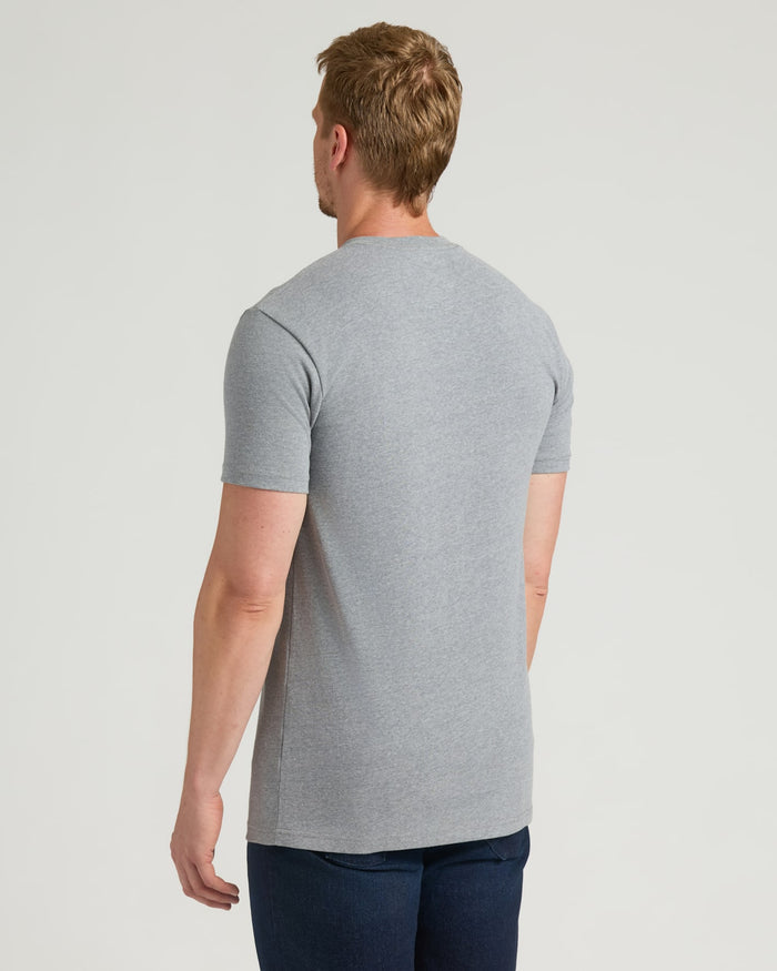 Back view of Heather Gray Tall Heavyweight Pocket Crew on person.