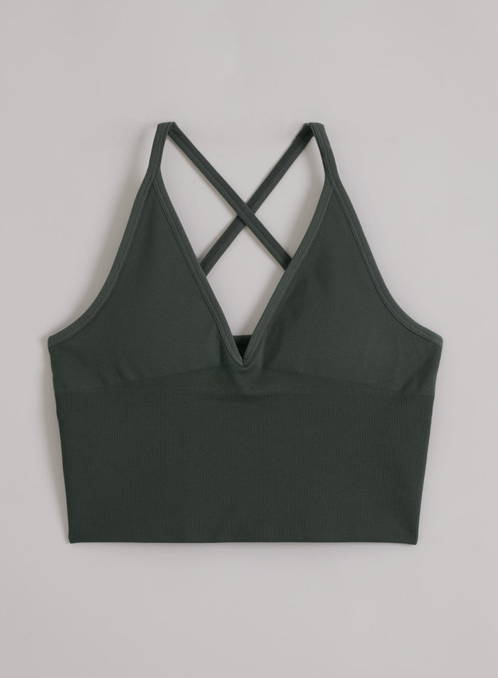 Ivy green Shape Seamless Cross Back Bralette with ribbed details and strappy back, flatlay by aim'n.