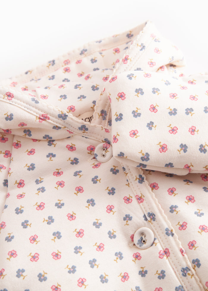 The jacket for newborn and baby with hat, snap closure, and flower pattern.