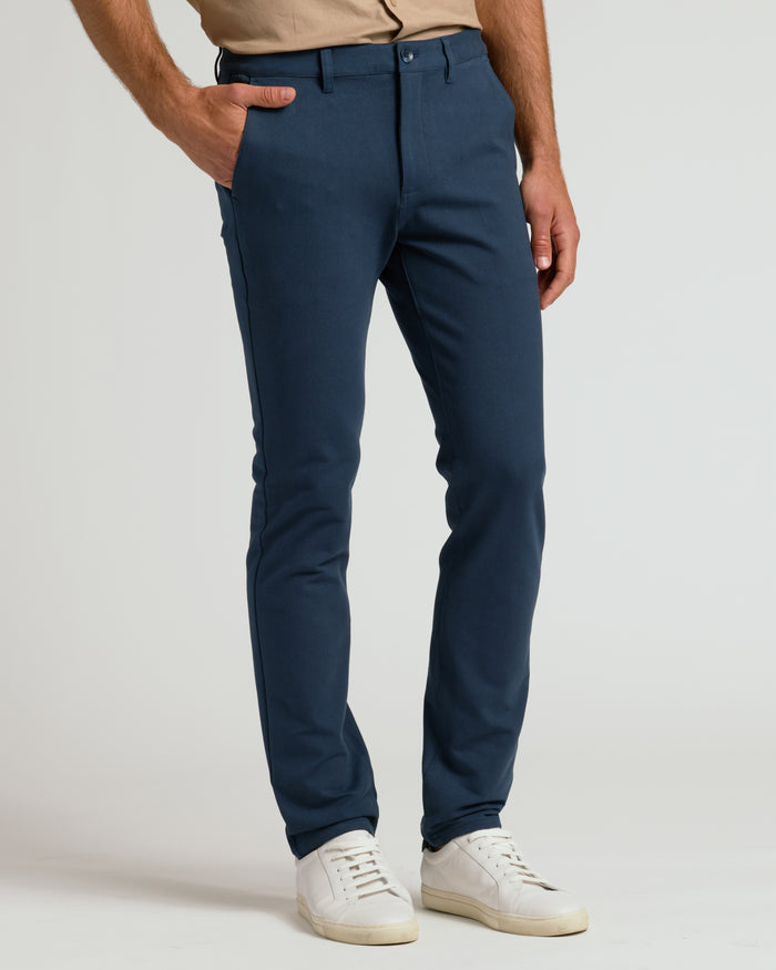 Navy & Carbon Slim Chino Pants 2-Pack with white sneakers.