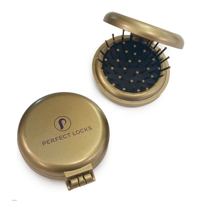 The Perfect Locks Compact Travel Brush is a gold, round, foldable brush with logo, shown open with bristles and closed—ideal for Remy hair extensions.