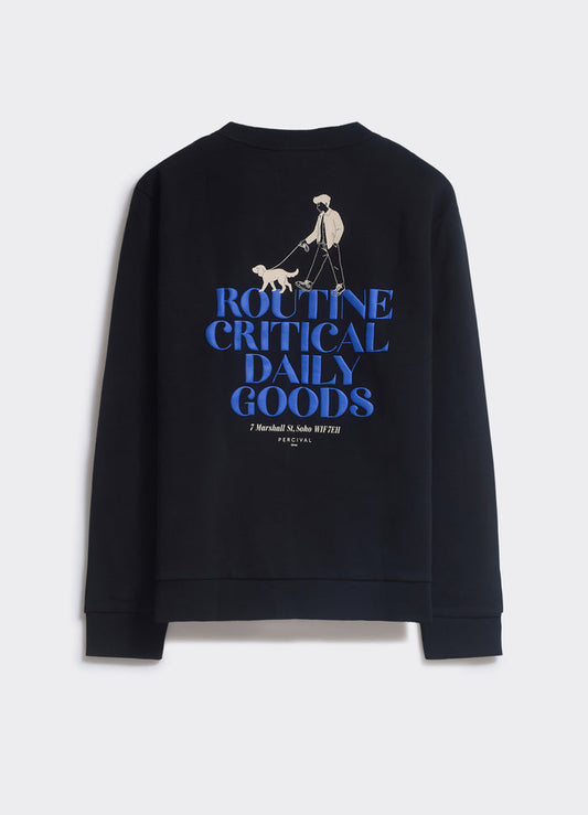 The black Percival Routine Sweatshirt in midweight jersey, featuring a blue back graphic and dog walker illustration.