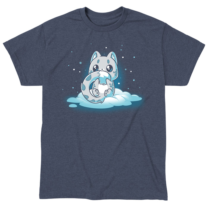 Classic Cotton T-shirt_TeeTurtle heather navy Snuggly Snow Leopard apparel featuring a baby snow leopard with large eyes chewing on its tail. It's sitting in the snow with snowflakes falling around it.