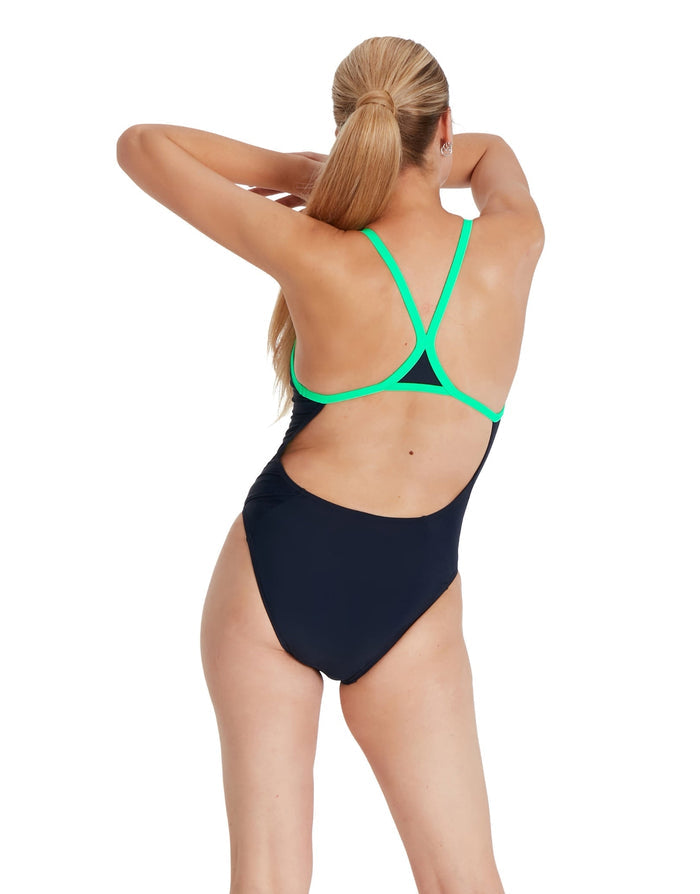 Speedo Hyperboom Turnback swimsuit in navy blue with green accents and crisscross back