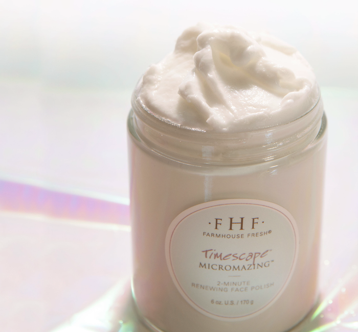 Jar of Timescape™ Micromazing™ 2-Minute Renewing Face Polish | Farmhouse Fresh with creamy white exfoliating polish texture inside, displayed on a light reflective surface.
