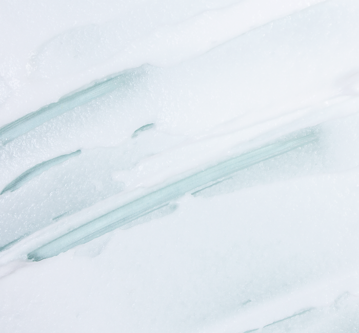 Close-up texture of refreshing exfoliating face polish cream with fine microbeads gently spread, showcasing the smooth and renewing skincare formula of Timescape™ Micromazing™ 2-Minute Renewing Face Polish | Farmhouse Fresh.
