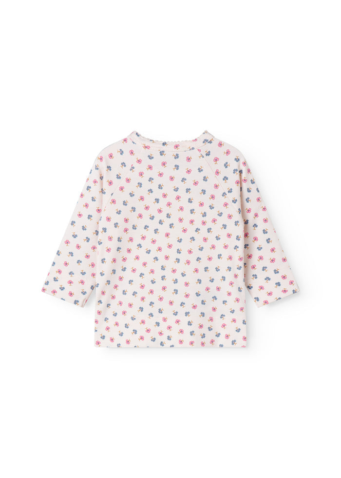 Fitted blouse for newborn baby with snap closure and floral print