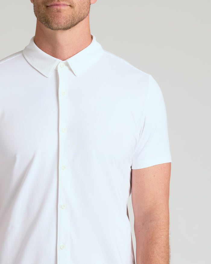 Man wearing White Short Sleeve Comfort Knit Shirt with collar and buttons.